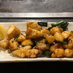 なんばん亭 - イカゲソバター焼
            squid stir - fry with garlic butter 