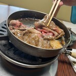 牛銀本店 - 仲居さんがひっくり返します