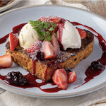 French cuisine with strawberries and berry sauce