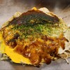 Okonomimura Takenoko - 肉玉そば(税込900円)
                ・茹で生中太麺(磯野製麺所)
                ・ミツワソース
                ・焼き方:ヘラで押さえる
                ・焼き上がりの形:やや乱れた円形の焼き上がり
                ・鉄板又は鉄板皿で食べるのがスタンダード 