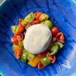 Seasonal fruits and burrata cheese