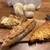BOUL'ANGE - 料理写真:画像最上部　アンジュの白パン、左手　オニオンベーコンクロワッサン、中央　大葉と松の実の明太フランス、右手　ベーコンポテトデニッシュ