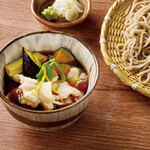 Soba noodles with dipping sauce and fresh vegetables and Takumi pork