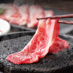 Lightly seared black wagyu beef Sukiyaki (Yogan-yaki (roasted on a hot stone))