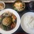 洋食店 LAPIN - 料理写真:ハンバーグ(デミグラスソース)1200円+香草110円。パン粉の下にある緑色がおそらく香草の正体だろう。