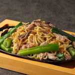 Fried noodles with dried bonito flakes and Yakisoba (stir-fried noodles) green onions in soy sauce