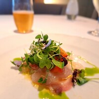 カシータ - ⚫前菜
                    「真鯛のカルパッチョ  アメーラトマトとハーブサラダ」