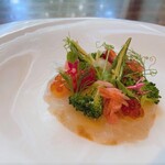 Amberjack carpaccio with citrus vinaigrette and garden-style summer vegetable grecque