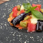 Homemade basil gnocchi with pomodoro sauce made with mozzarella cheese and fruit tomatoes