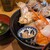 一寸法師 - 料理写真:上海鮮丼タイのお頭焼き乗ってます！小皿の上には黒にんにく！
