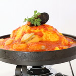 熱々鉄板焼き！シーフードオムライス 1,710円（税込 1,881円）
