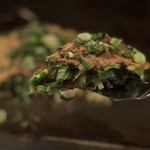 お好み焼き いまり - 重ね焼き「ねぎ焼き」のカリッと系
      
      うす焼きの「ねぎ焼き」はたいてい蒸し焼きにされトロっとするのがこのカラッとした焼き技はスゴイ