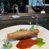TRATTORIA CREATTA - 仔羊の春巻き仕立て ペルノー香るオレンジのソースとグリーンピース