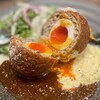 ステーキ&グリル ロマン亭 - スコッチエッグ　
濃厚で鮮やかなオレンジ色の蘭王を使用