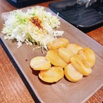 博多豊一 - たいらぎのバター炒め