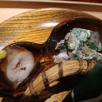 かねき - 左　タコの柔煮　右　きゅうり