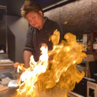 鉄板焼 炭焼 さいとう - 鉄板焼きと言えば！豪快なフランベ。