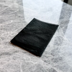 Longrain Tokyo - 冷しトムヤムクンヌードルと共に出してくれる「紙エプロン」