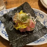 居酒屋 ちょーちょ - お通しのトロたく。胃袋を掴まれる。