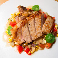 骨付き豚ロースの窯焼き