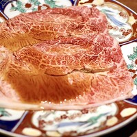 焼肉 龍華園 - 鹿児島黒牛1枚みすじの炙り焼き