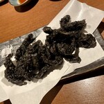 さかな市場 - イカゲソのイカ墨天ぷら