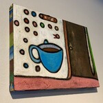 コーヒーとおやつの店 アンドモア - 素敵な絵も飾られていました…