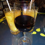 オステリア ガリレオ - オレンジジュースとグラスワイン赤