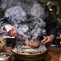 黒毛和牛の牧草焼