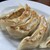 珍来 - 料理写真:餃子焼きたて。皮はモチっと。