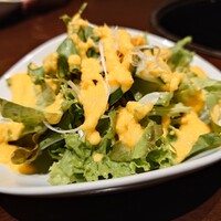 炭火焼肉 ふちおか - 玉葱と人参ドレッシングのサラダ
