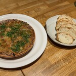 洋食 おがた - つぶ貝　アンチョビバターソテー