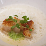 Simplicité - ランチコース 12100円 の帆立焼き 枝豆リゾット 貝の出汁のスープ 生姜の香り