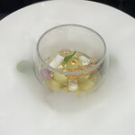 ラ ターブル ドゥ ジョエル・ロブション - デザート　アマレットの香りをまとわせたマスクメロンにココナッツのブランマンジェを合わせて(プラス料金)