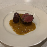NALA - メイン肉料理 犀川産夏鹿のロースと自家製チョリソーの薪焼き カフェドパリバターソース
