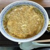 萬来食堂 - 萬来ラーメン　酸っぱい胡瓜漬けが嬉しい。