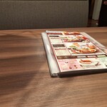 ロイヤルホスト ららテラス HARUMI FLAG店 - テーブルの上のメニューです。