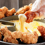 韓国酒場 コッキオ - その他写真:UFOチキン（持ち上げ）