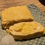 しおて - とうもろこしのだし巻き（半分に切っていただいたものを箸で割ったところ）