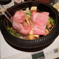 飛騨牛一頭家 馬喰一代 銀座 - お肉投入