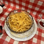 タヴェルナ・ポルチーニ - チーズがわんさかかかったポテトフライ