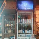 味の蔵どんつく - 冷蔵庫の上のテレビでは、大曲の花火大会