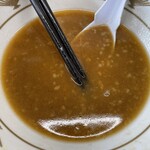 ラーメン もっけだの - 『青唐味噌ラーメンニンニク野菜マシマシ』のスープ