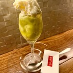 麹町ビストロ 階段の途中 - メロンのデザート。シロップ漬けのメロンも美味しければ、上に乗ったココナッツミルクのソルべの爽やかさがとても夏らしくて良いです。