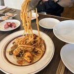 IL PLANETARIO - やわらかいタコとオリーブのプッタネスカ