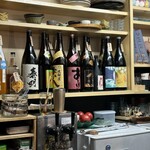 天ぷら はせ川 - 焼酎の一升瓶が並んでます