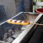 焼きまんじゅう島村 - しばらくすると一気に香ばしい焼き色へ