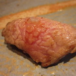 鮨 久いち - 炙り大トロ　（にんにく）