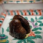 温石 - 蟹の出汁が残ったお皿に、ポンと炭火焼き椎茸。椎茸のお味が濃い。