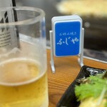 お好み焼き ふじや - お客さんからのプレゼントという「ミニ看板」
      ボタンを押すとライトが光る、愛のある看板